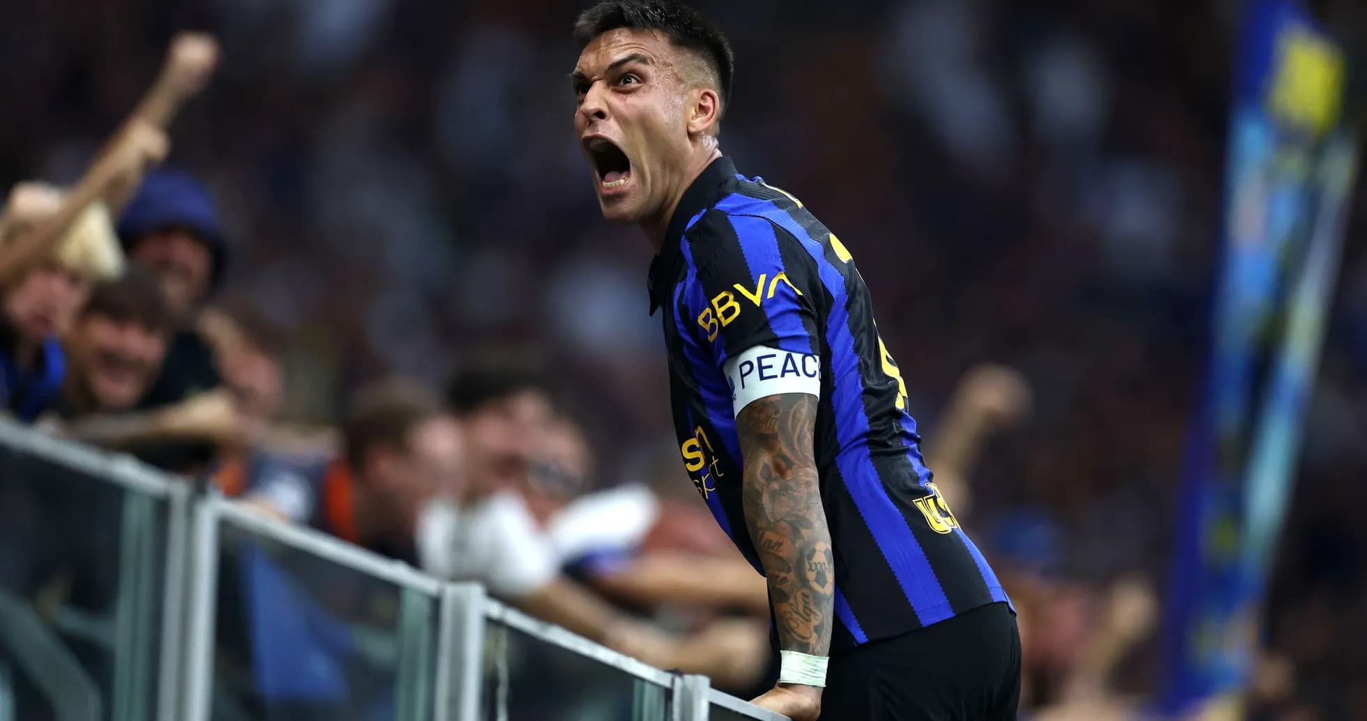 Lautaro Martínez celebrating with fans during match Lautaro Martínez celebrating with fans during match