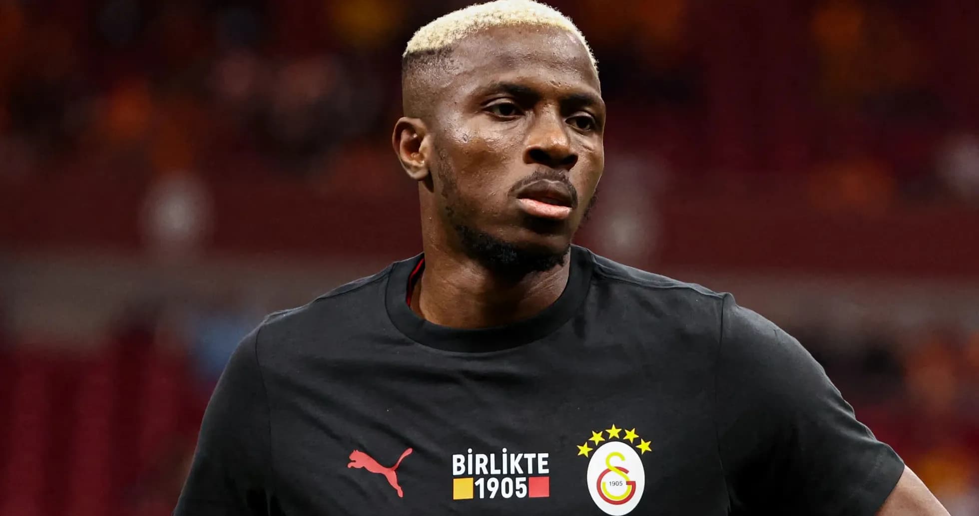 Player warming up in Galatasaray training kit Player warming up in Galatasaray training kit