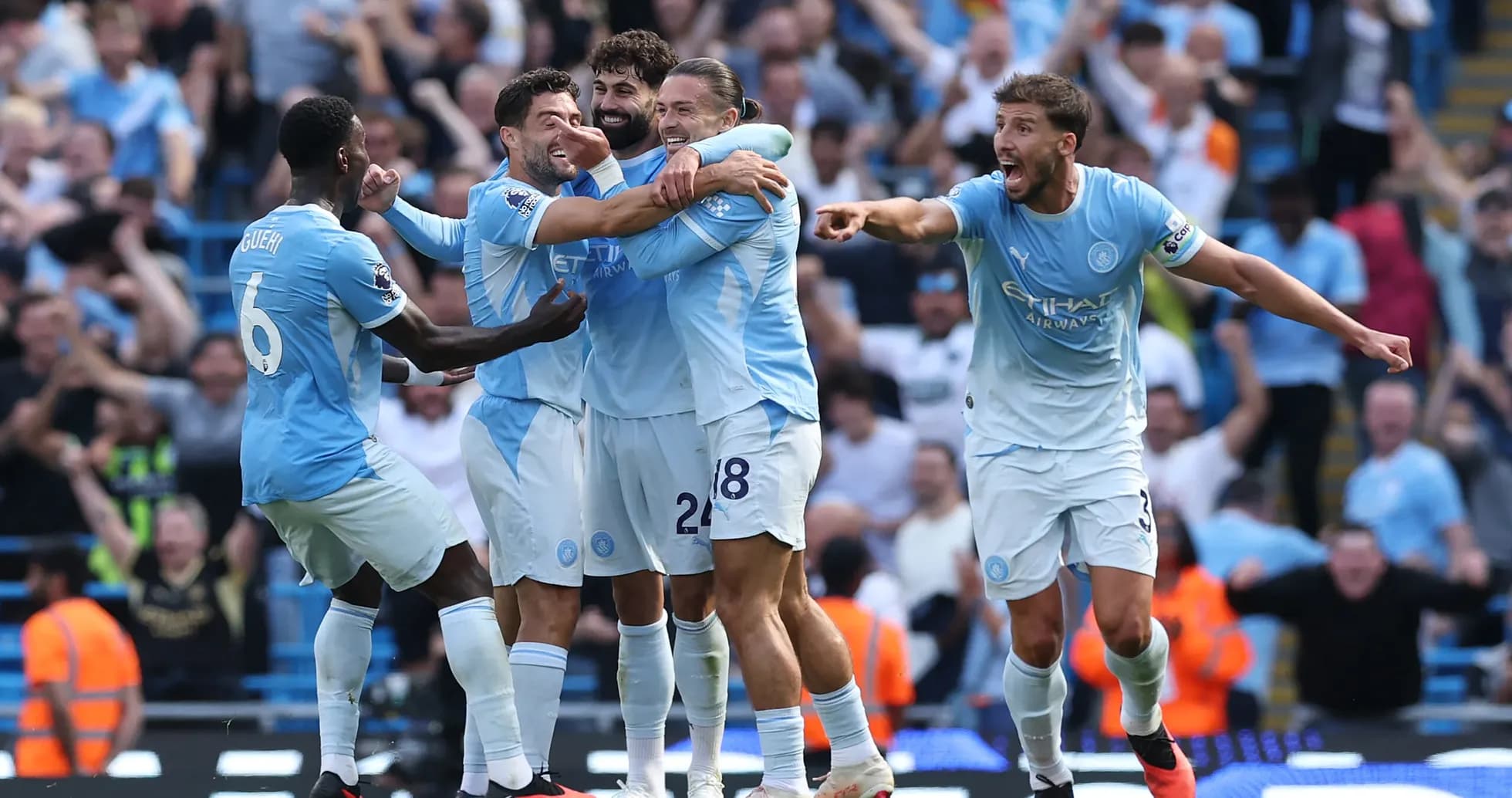 Manchester City players celebrating a goal Manchester City players celebrating a goal