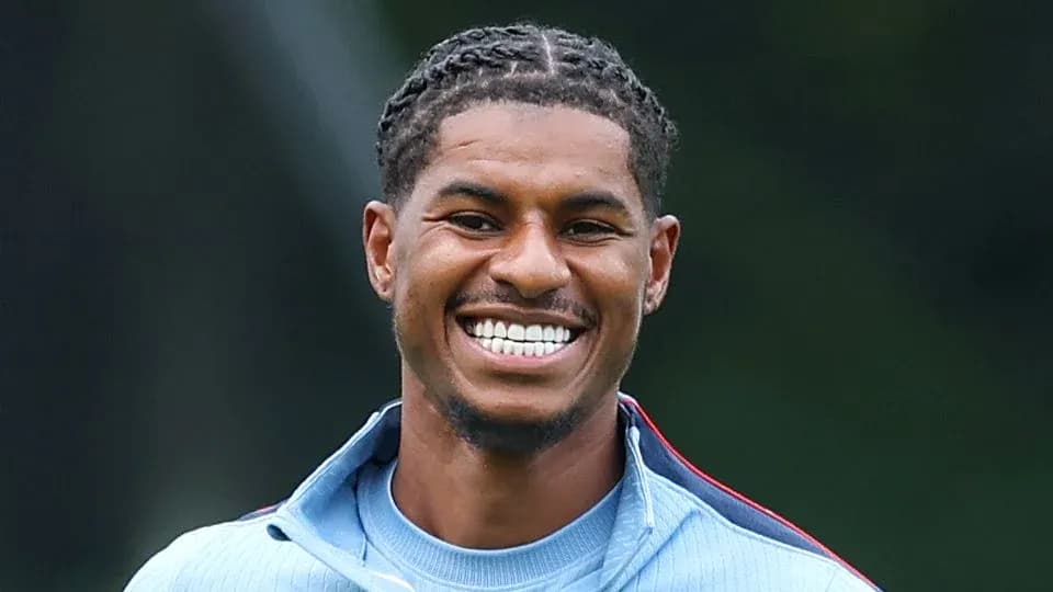 Player smiling during training session outdoors Player smiling during training session outdoors