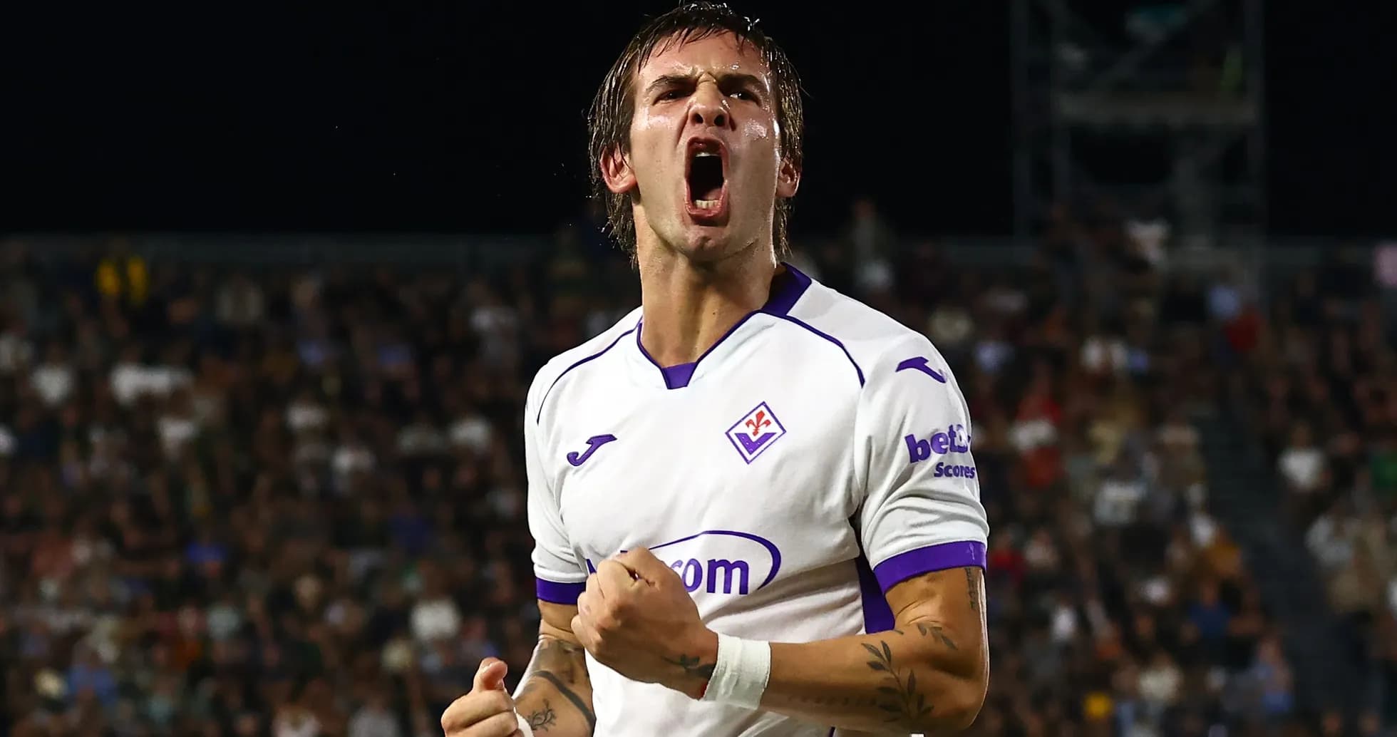 Player celebrating a goal during a match Player celebrating a goal during a match