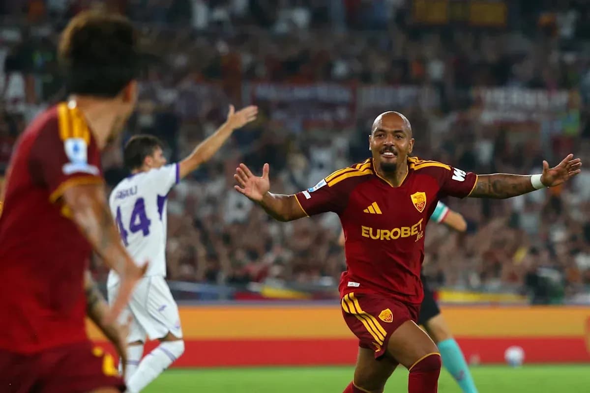 Player celebrating goal during match at stadium Player celebrating goal during match at stadium