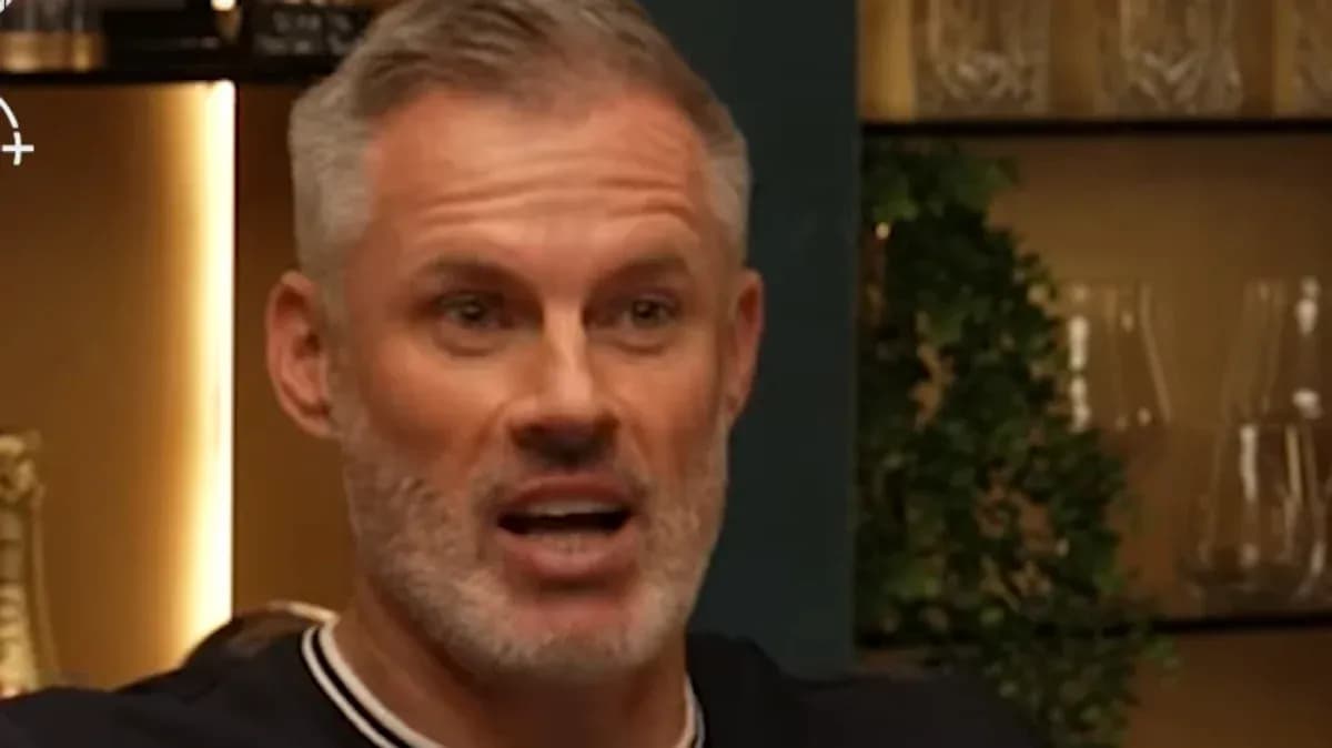 Man speaking animatedly in a discussion setting Man speaking animatedly in a discussion setting