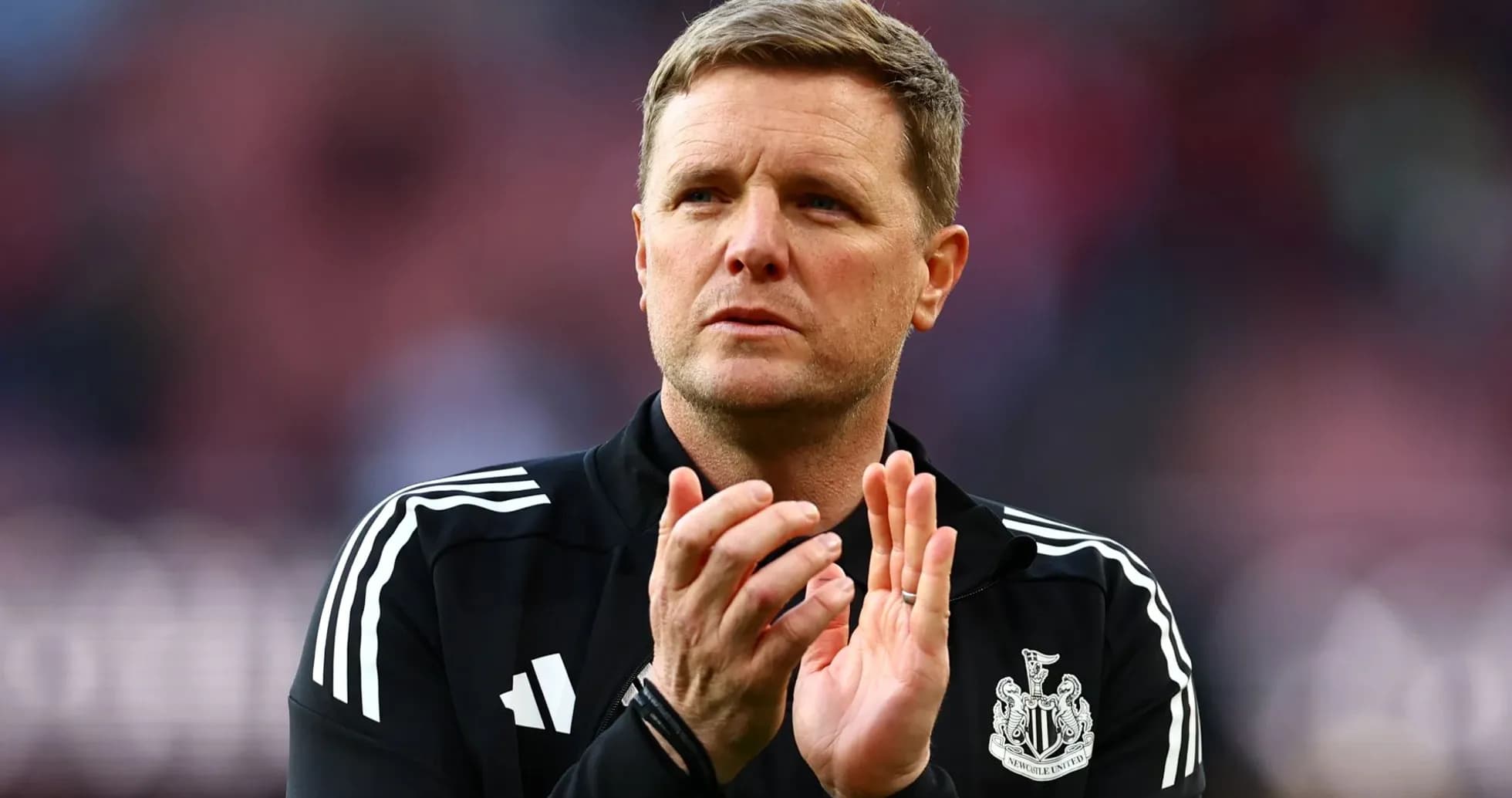 Newcastle United manager clapping on the sidelines Newcastle United manager clapping on the sidelines