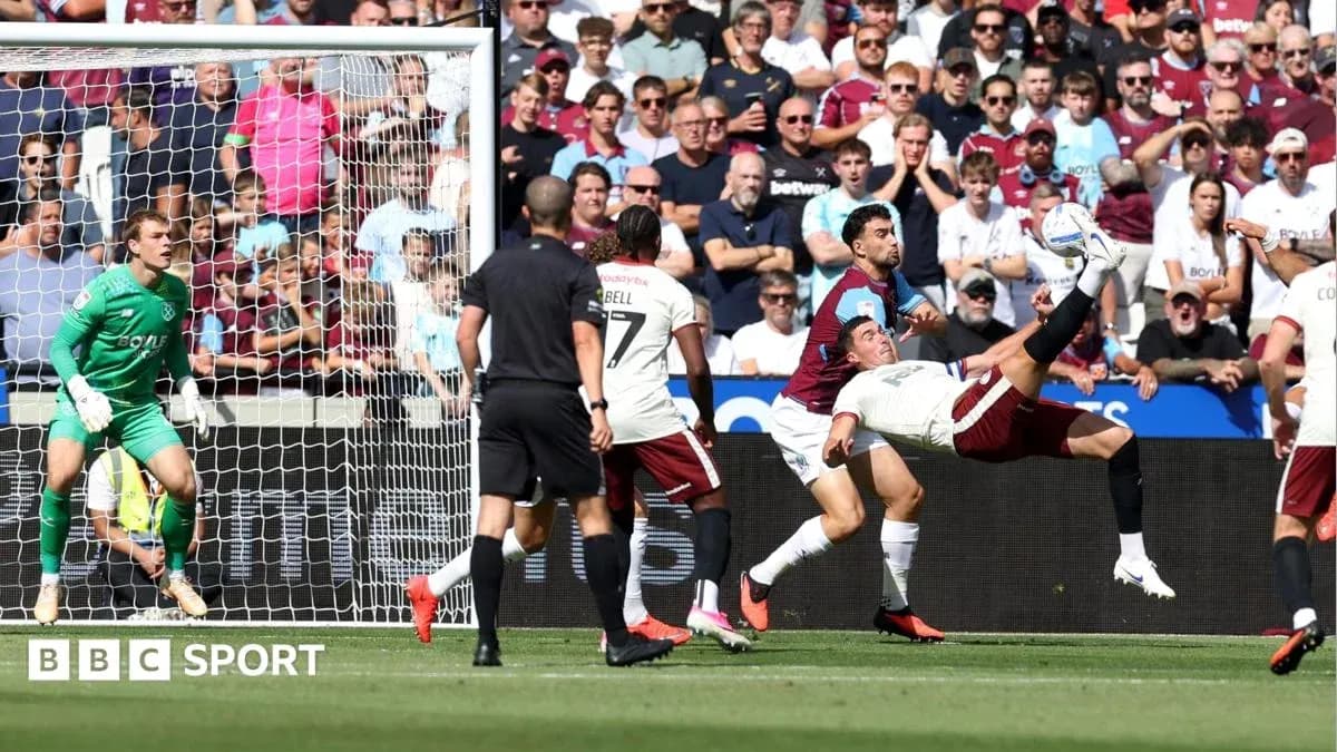 Player executing a bicycle kick near goal Player executing a bicycle kick near goal