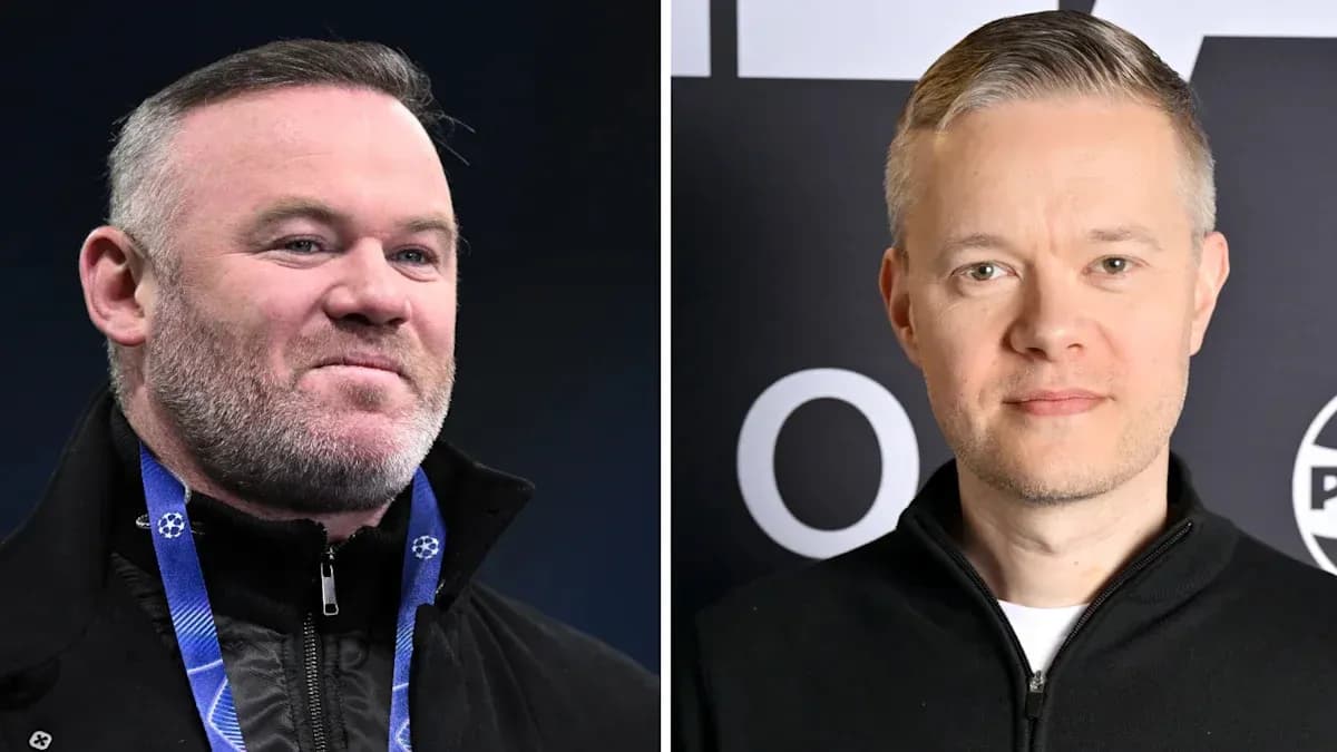 Two men posing for photos at an event Two men posing for photos at an event