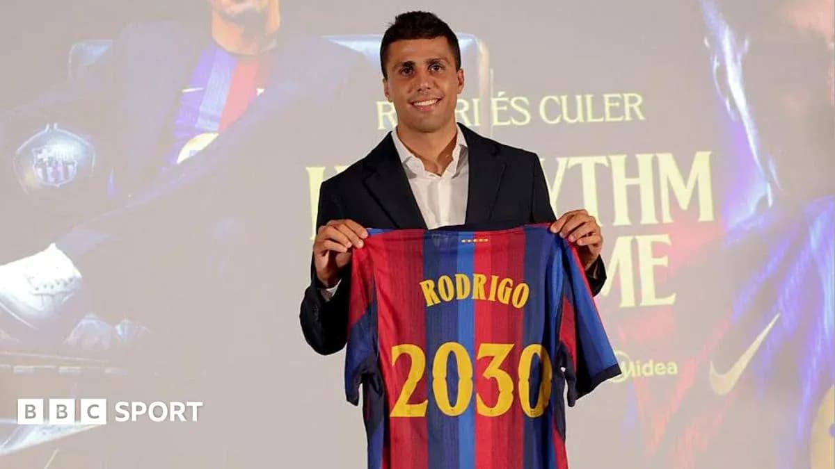Player holding Barcelona jersey with name Rodrigo and number 2030 Player holding Barcelona jersey with name Rodrigo and number 2030