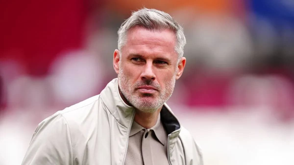 Man in beige jacket at sports venue Man in beige jacket at sports venue