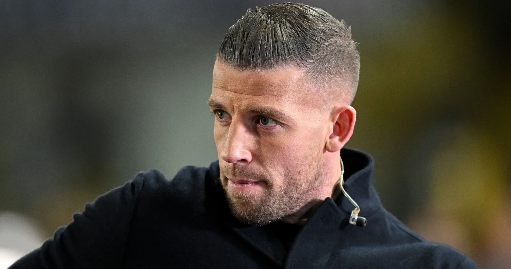 Man with short hair and beard in dark coat Man with short hair and beard in dark coat
