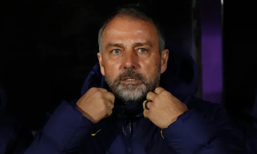 Coach adjusting jacket on the sidelines Coach adjusting jacket on the sidelines