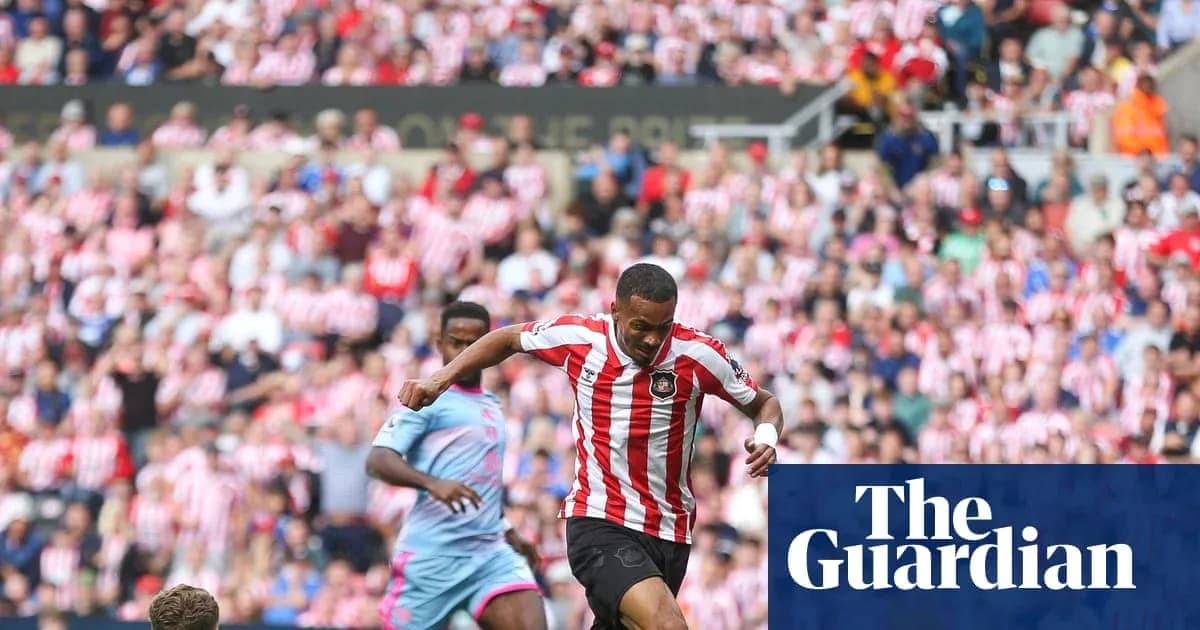 Player dribbling the ball past opponent in match Player dribbling the ball past opponent in match