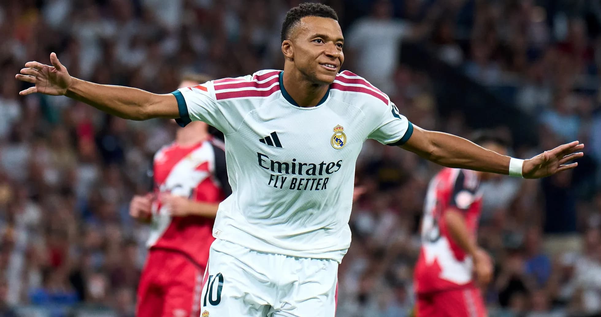 Player celebrating a goal during a match Player celebrating a goal during a match