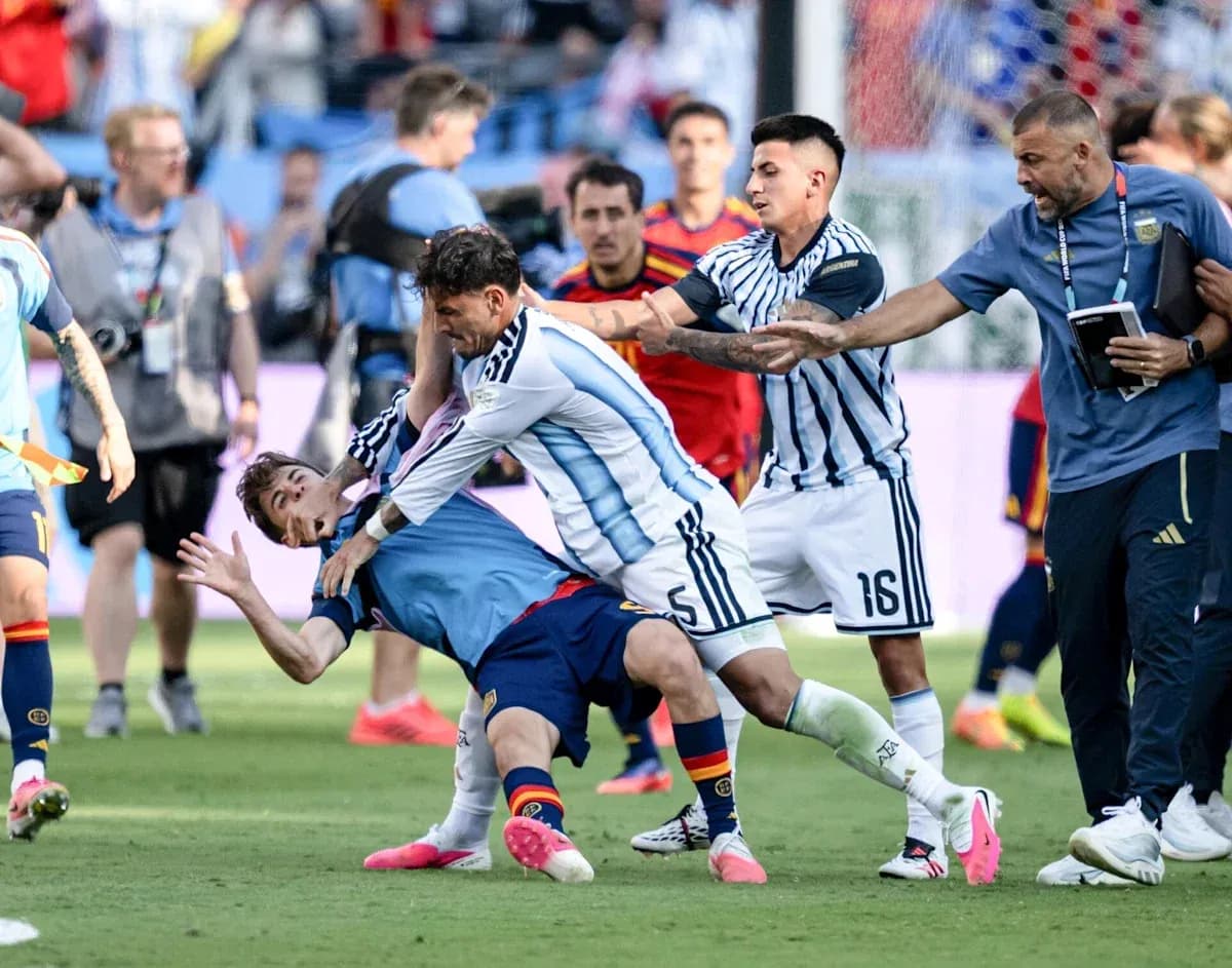 Players from Argentina and Spain in a confrontation Players from Argentina and Spain in a confrontation