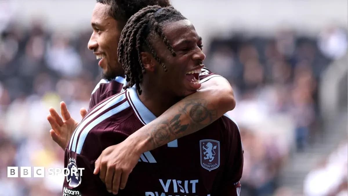 Aston Villa players celebrating a goal together Aston Villa players celebrating a goal together