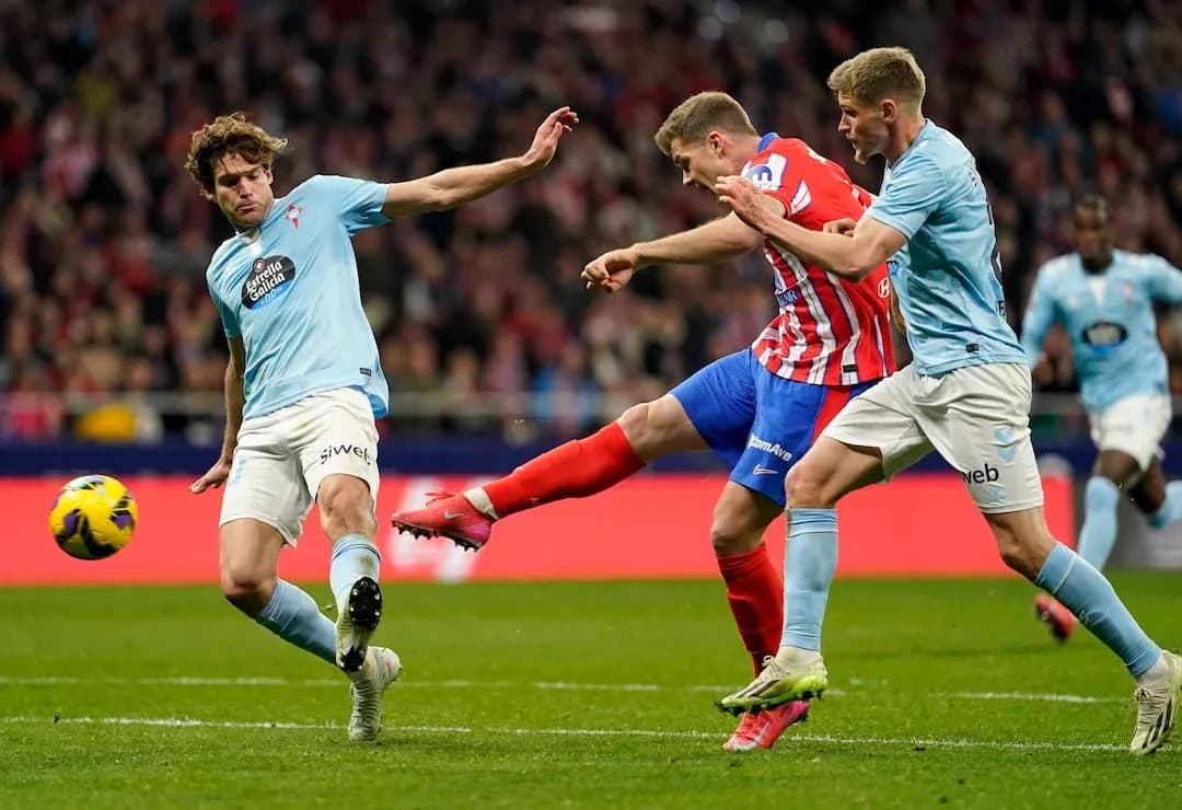 Atletico Madrid player shooting against Celta Vigo Atletico Madrid player shooting against Celta Vigo