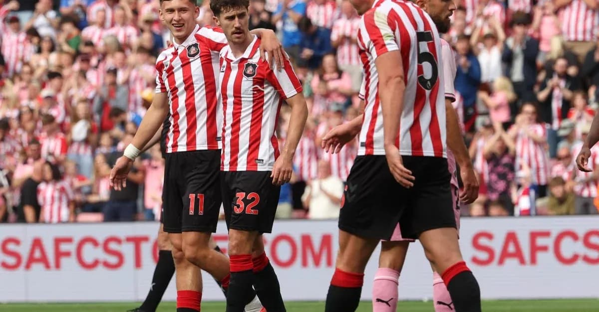 Sunderland players celebrating a goal together Sunderland players celebrating a goal together
