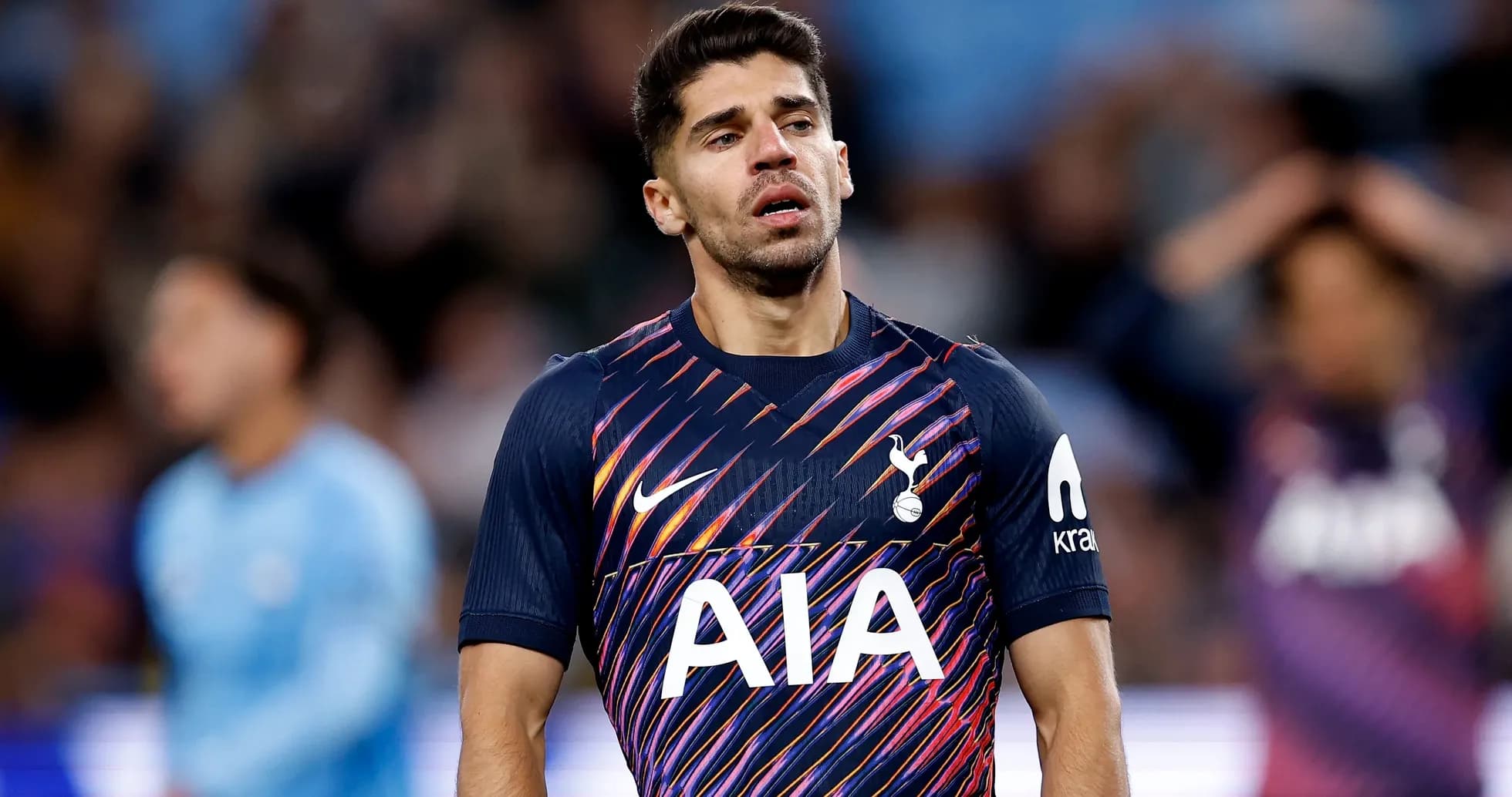 Tottenham player looking dejected on the pitch Tottenham player looking dejected on the pitch