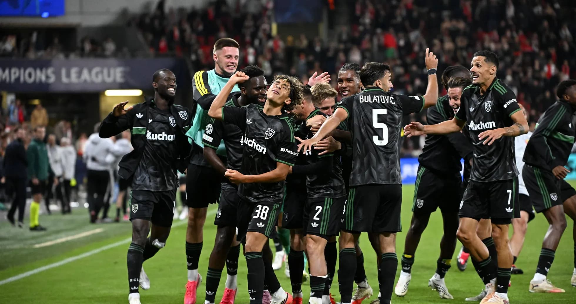 Players celebrating a goal during Champions League match Players celebrating a goal during Champions League match