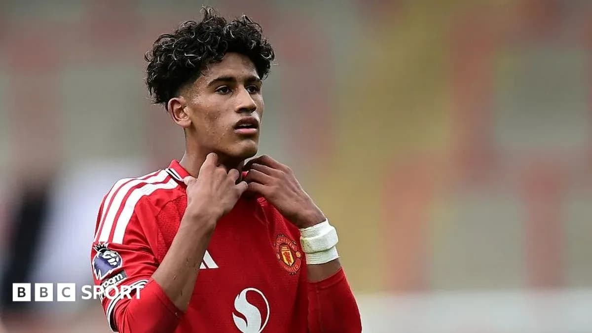 Young player adjusting his shirt during match Young player adjusting his shirt during match