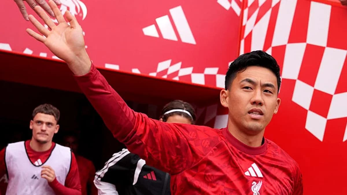 Player waving while exiting tunnel at stadium Player waving while exiting tunnel at stadium