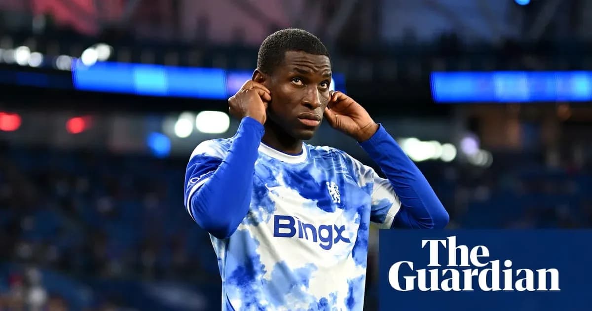 Player adjusting headphones before a match Player adjusting headphones before a match