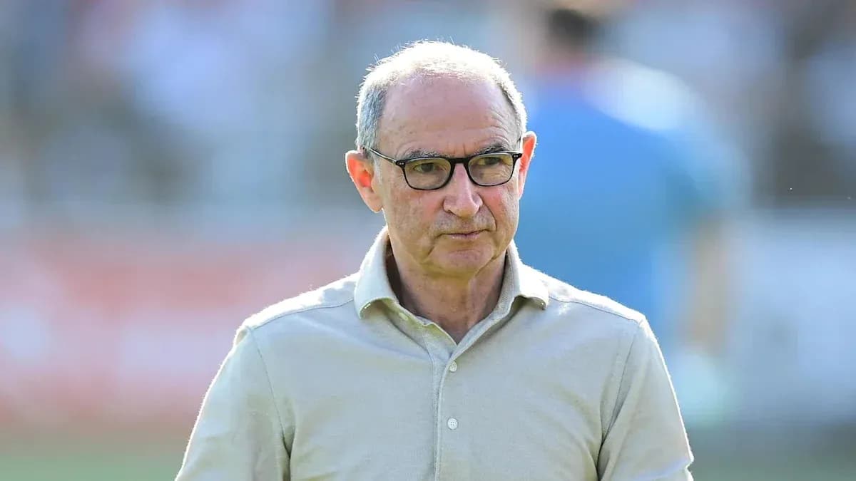 Man in glasses walking on a sports field Man in glasses walking on a sports field