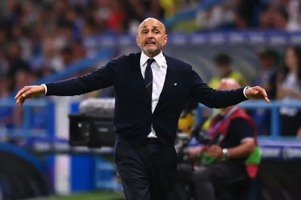 Coach gesturing during a football match on sidelines Coach gesturing during a football match on sidelines