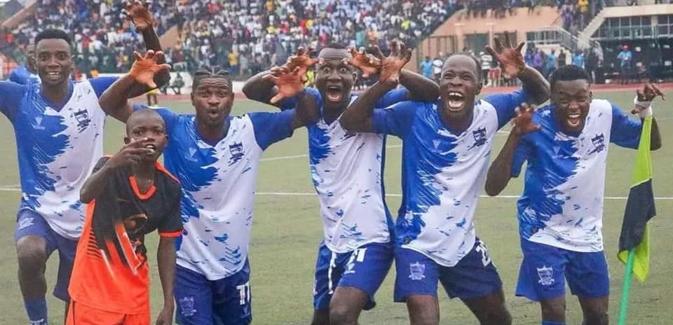 Doma United players celebrating a goal Doma United players celebrating a goal