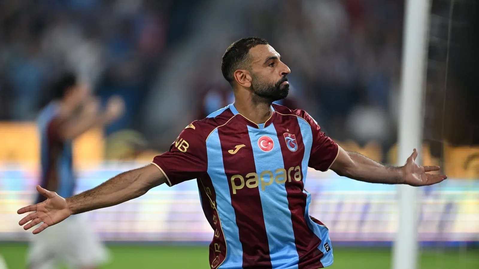 Player celebrating after scoring a goal in match Player celebrating after scoring a goal in match
