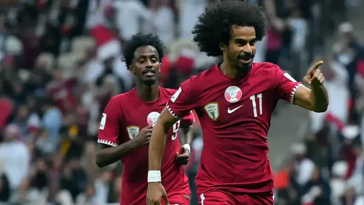 Qatar players celebrating a goal during match Qatar players celebrating a goal during match