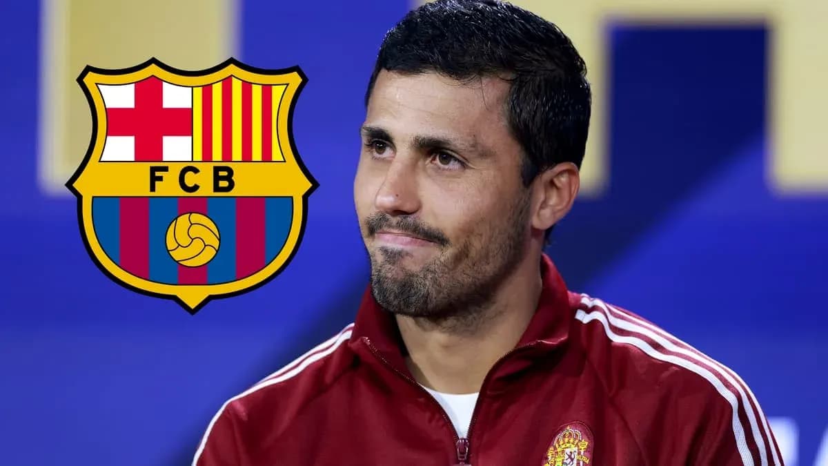 Player seated with FC Barcelona logo in background Player seated with FC Barcelona logo in background