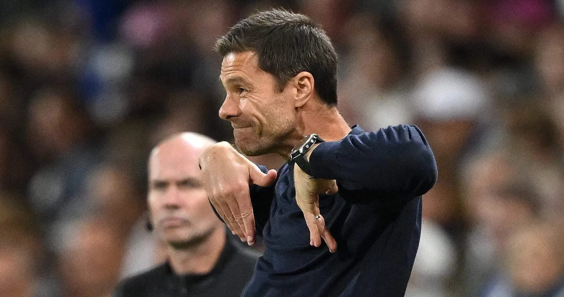 Coach gesturing during match on the sideline Coach gesturing during match on the sideline