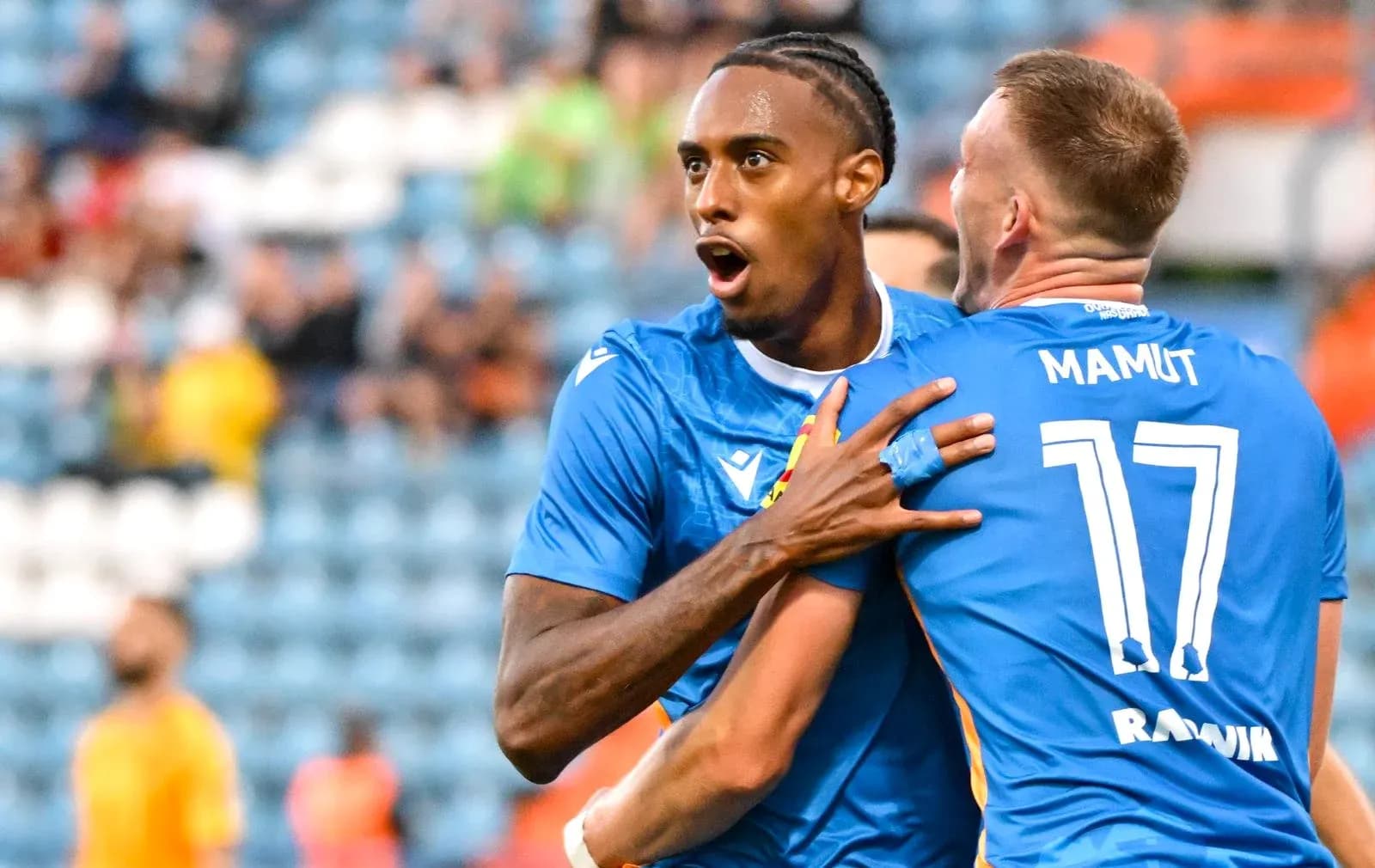Players celebrating a goal during match Players celebrating a goal during match