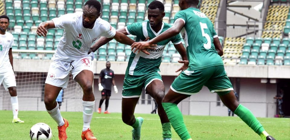 Enugu Rangers player dribbling against Nasarawa United Enugu Rangers player dribbling against Nasarawa United