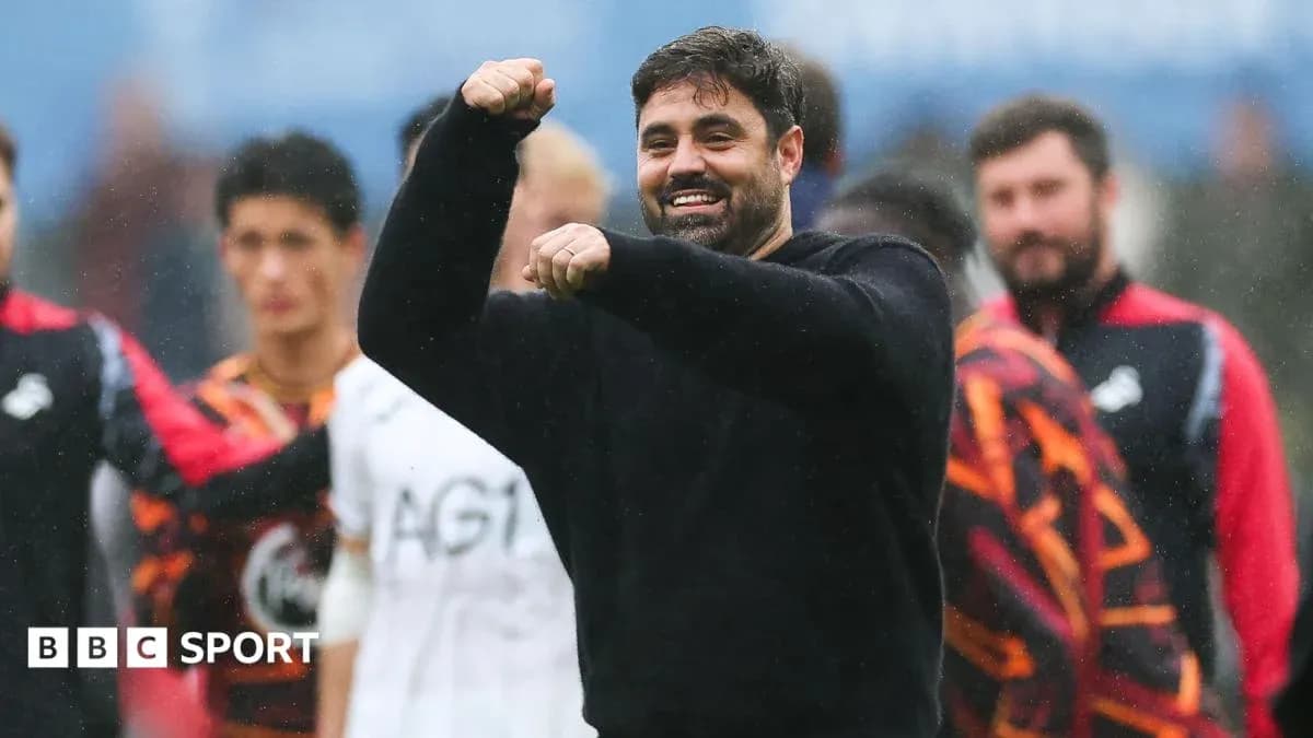 Coach celebrating with players in training session Coach celebrating with players in training session