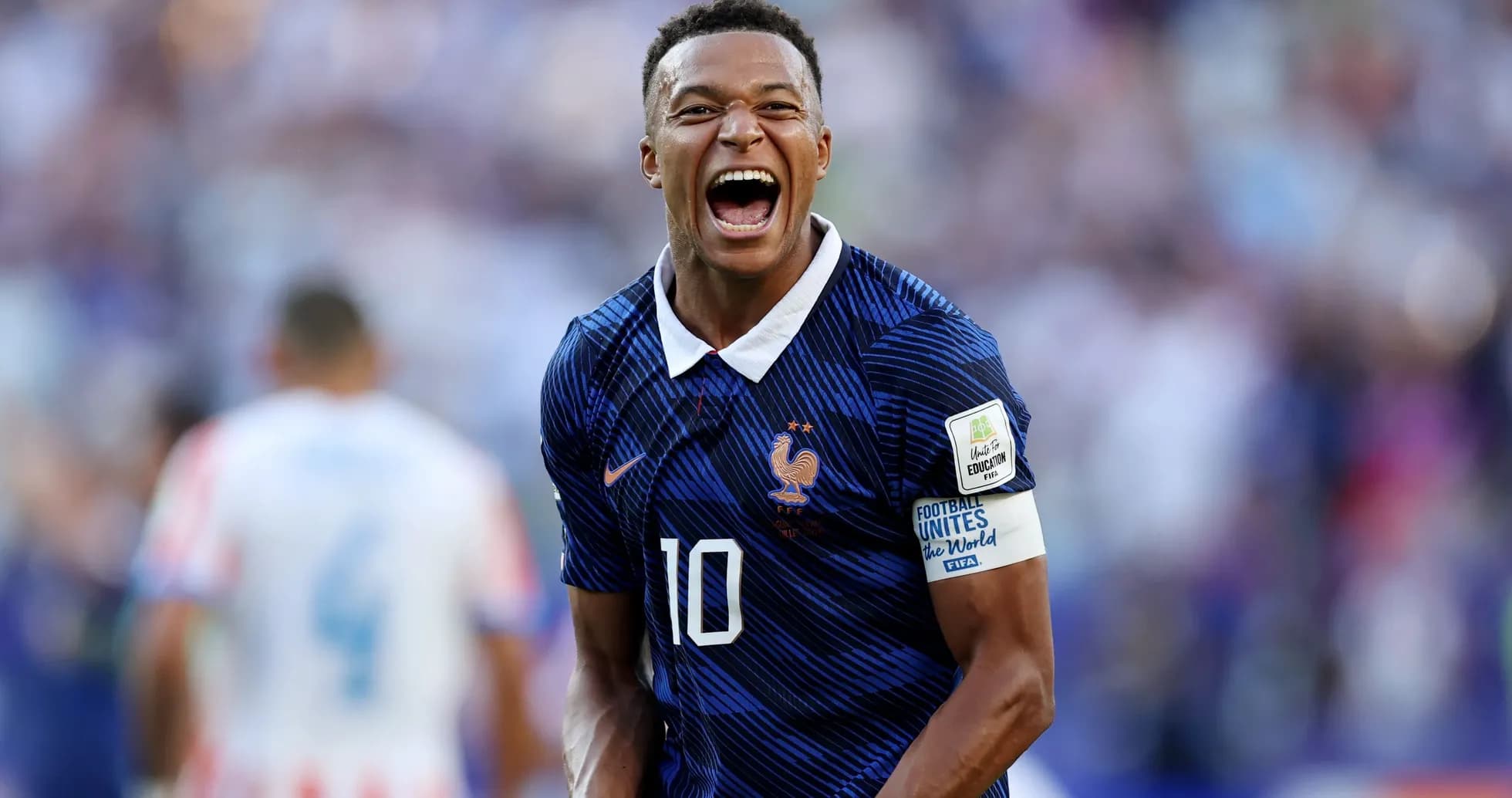 Player celebrating during a football match Player celebrating during a football match