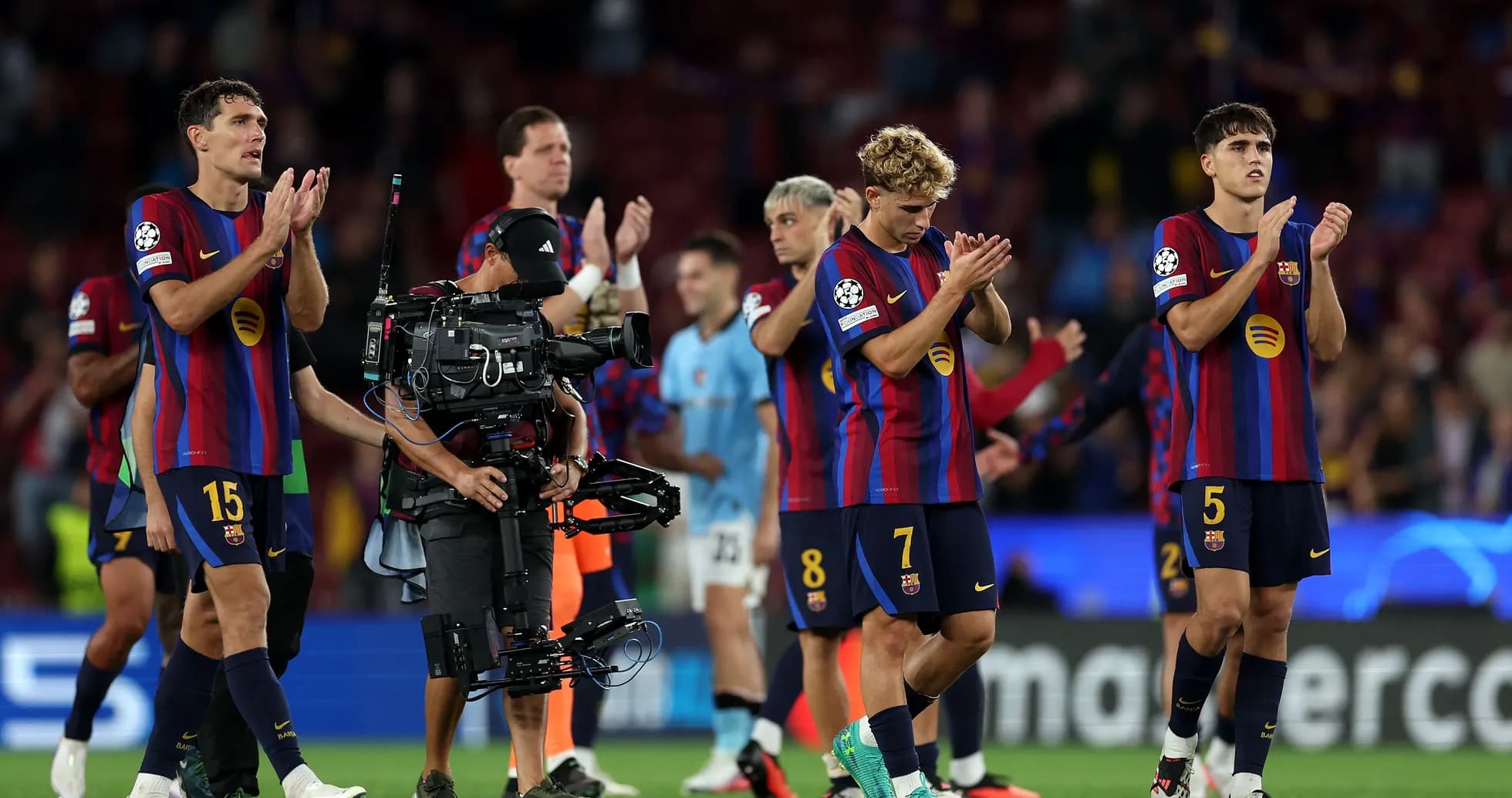 Barcelona players applauding fans after a match Barcelona players applauding fans after a match