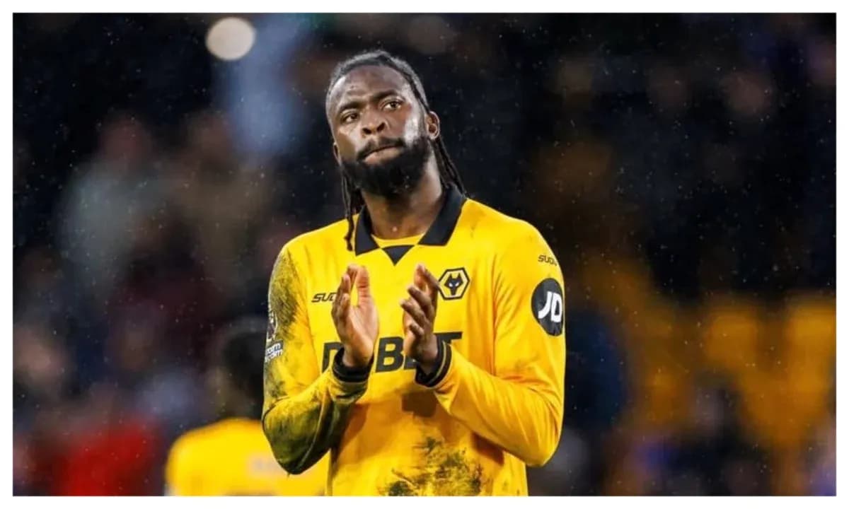 Player in yellow jersey applauding fans after match Player in yellow jersey applauding fans after match