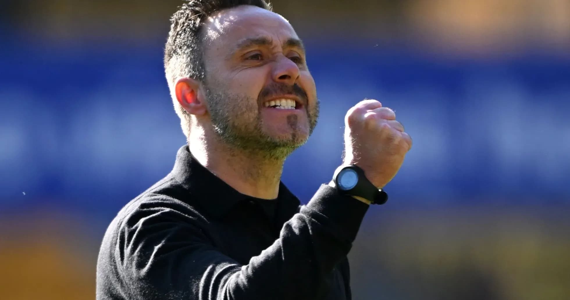 Coach celebrating passionately during a match Coach celebrating passionately during a match