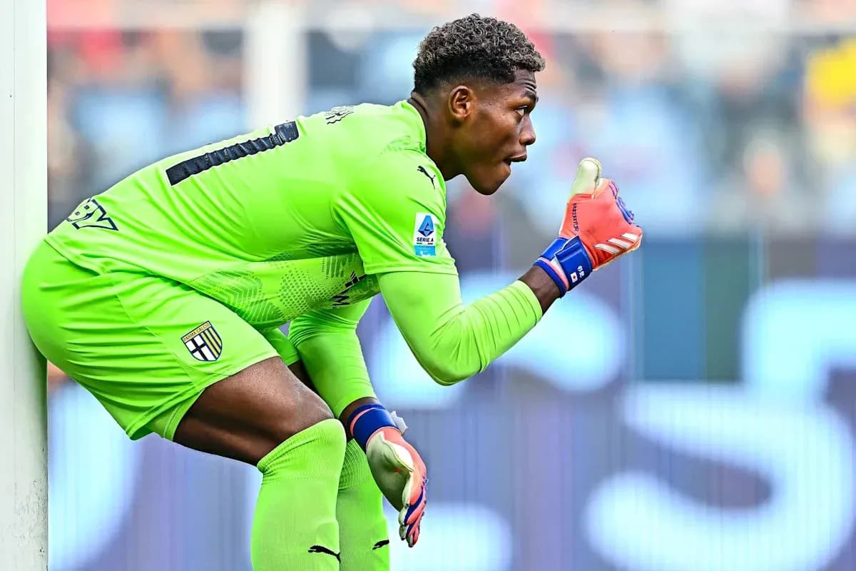 Goalkeeper in green kit signaling during match Goalkeeper in green kit signaling during match
