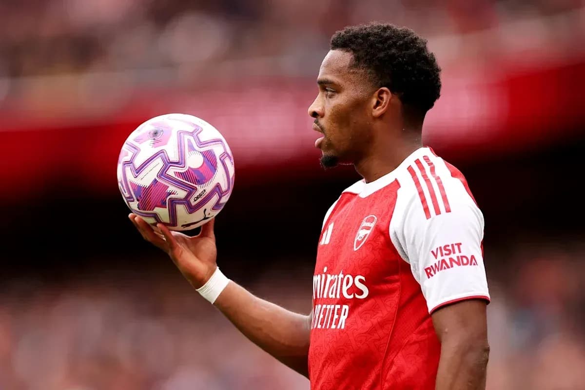 Player holding a ball during match at stadium Player holding a ball during match at stadium