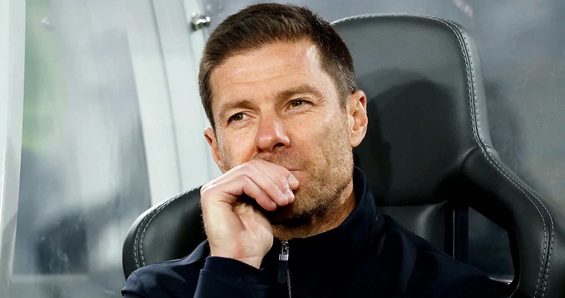 Coach sitting on bench during a match Coach sitting on bench during a match