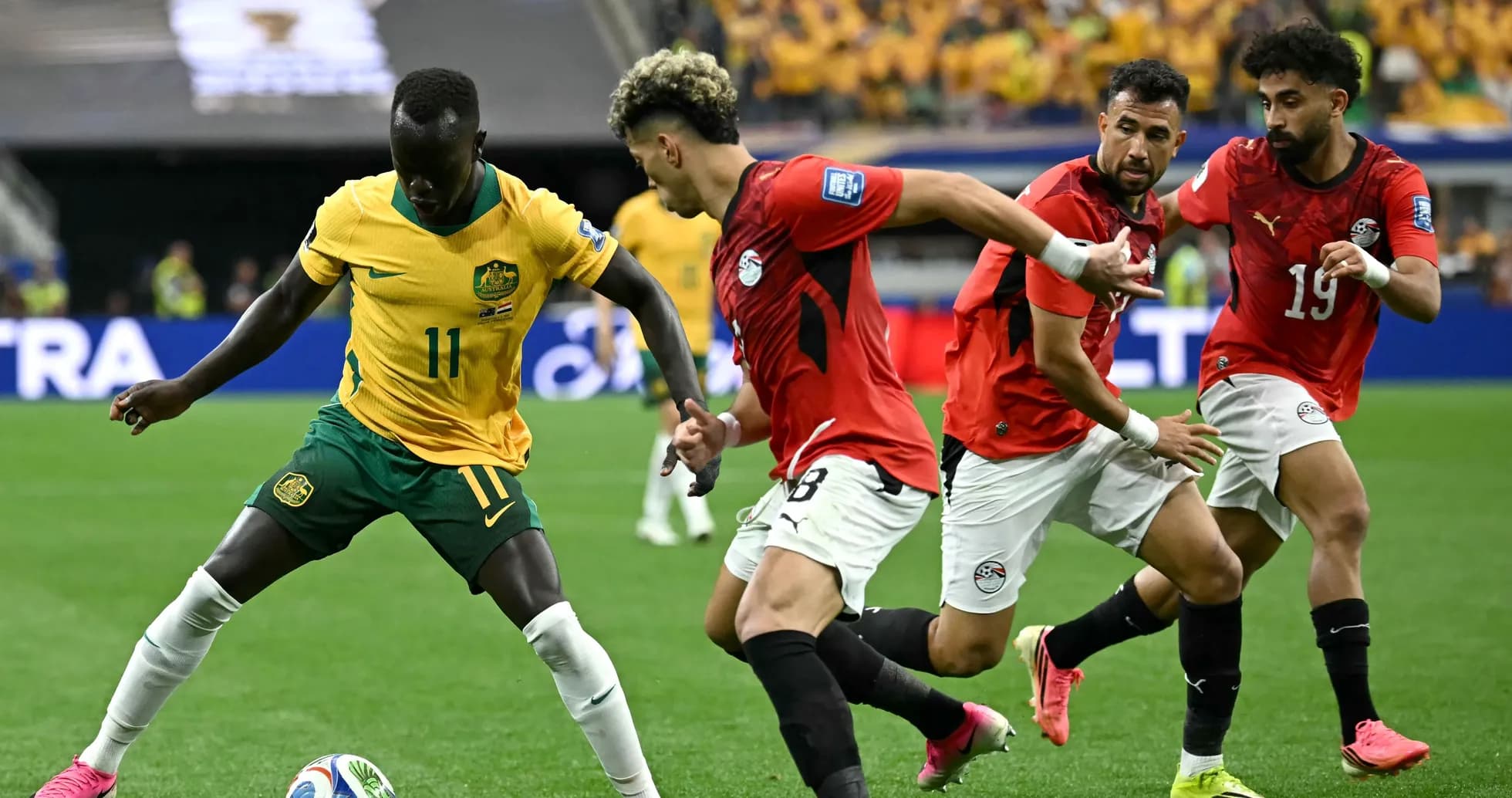 Australia and Egypt players contesting for the ball Australia and Egypt players contesting for the ball