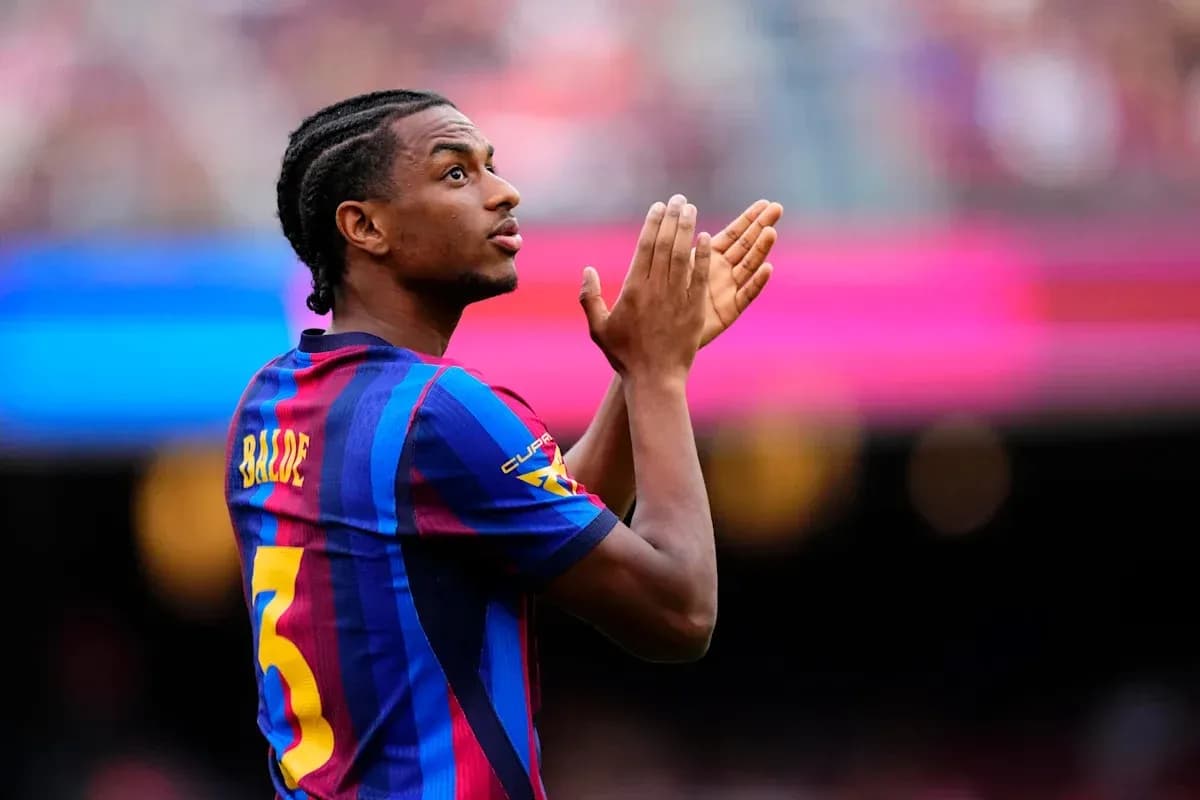 Player with number 5 clapping on the field Player with number 5 clapping on the field