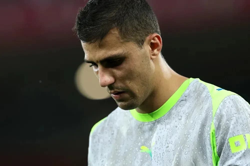 Player looking down while wearing training gear Player looking down while wearing training gear
