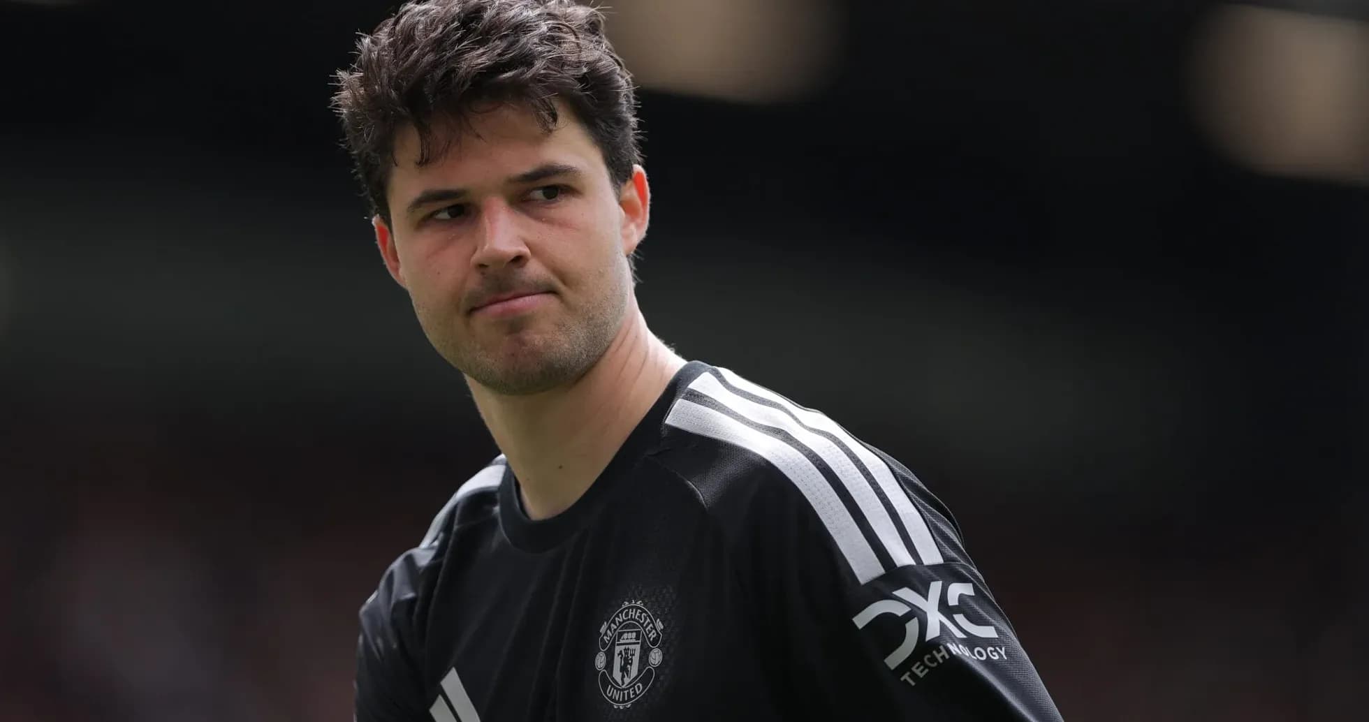 Goalkeeper in black kit before match Goalkeeper in black kit before match