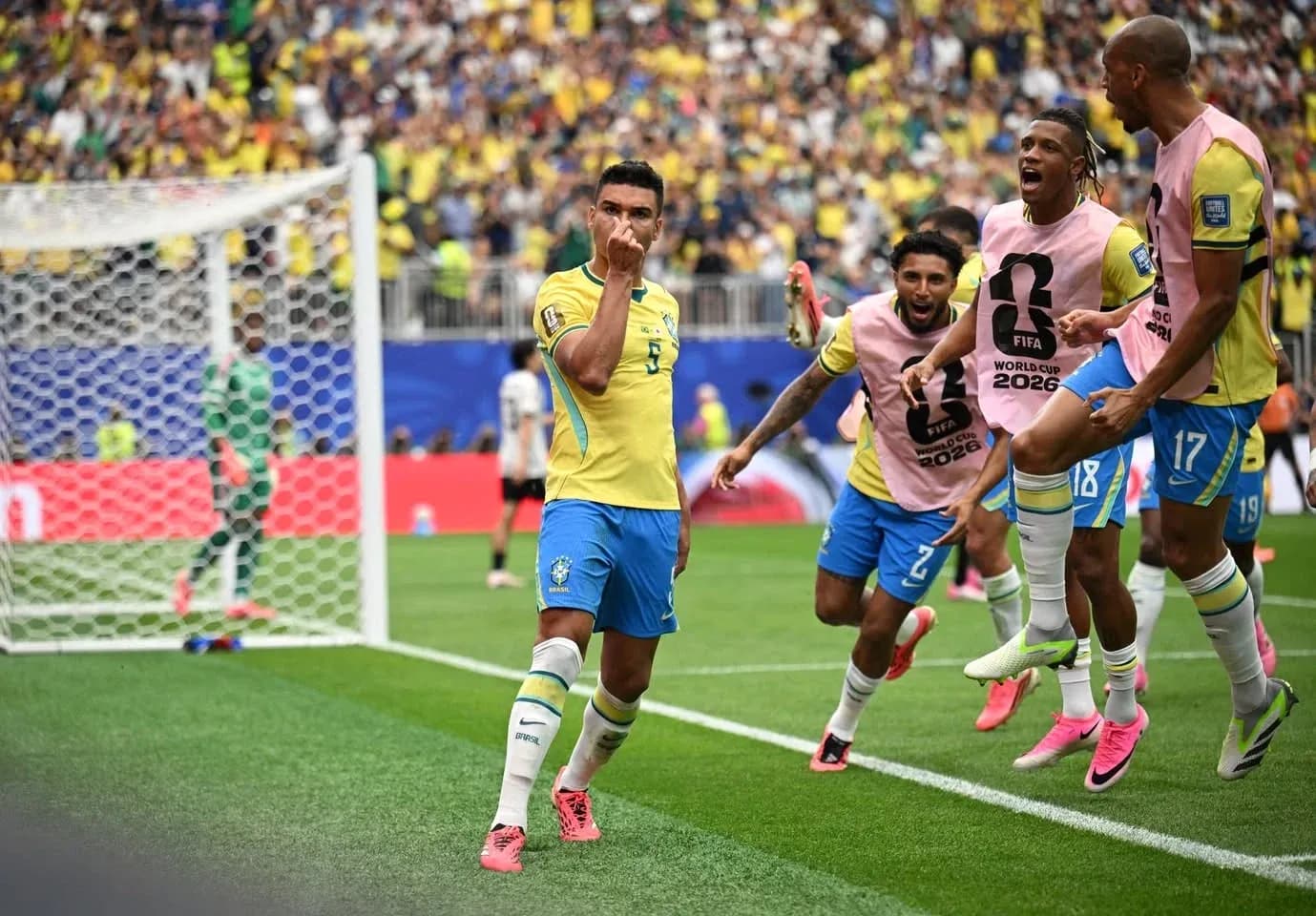 Brazil players celebrating goal during World Cup match Brazil players celebrating goal during World Cup match