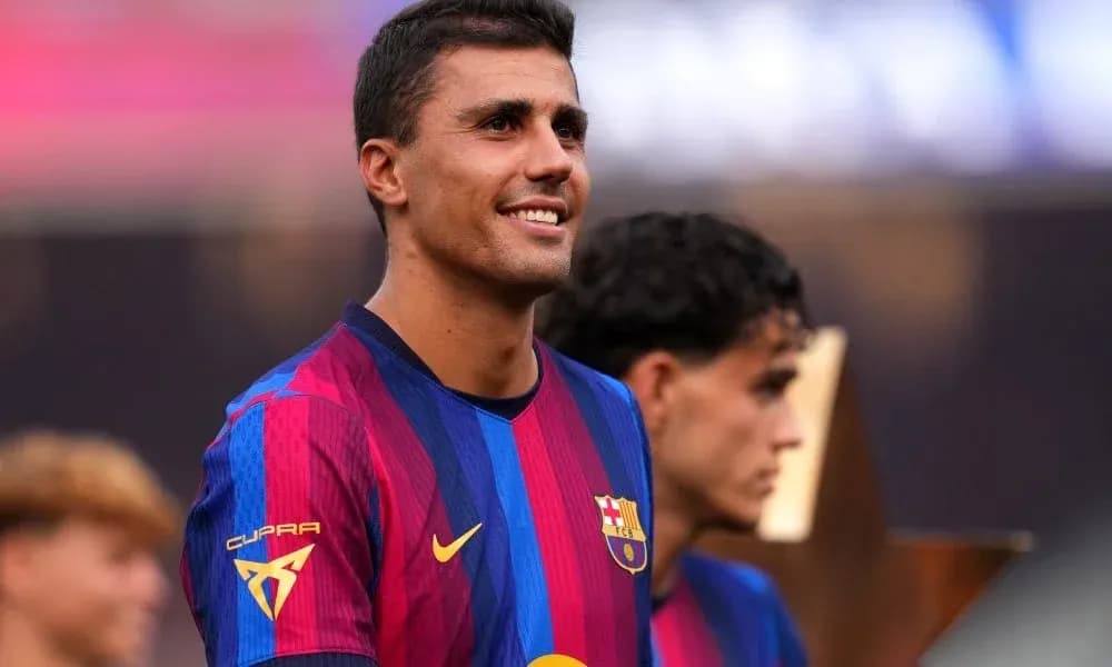 Barcelona player smiling during trophy presentation ceremony Barcelona player smiling during trophy presentation ceremony
