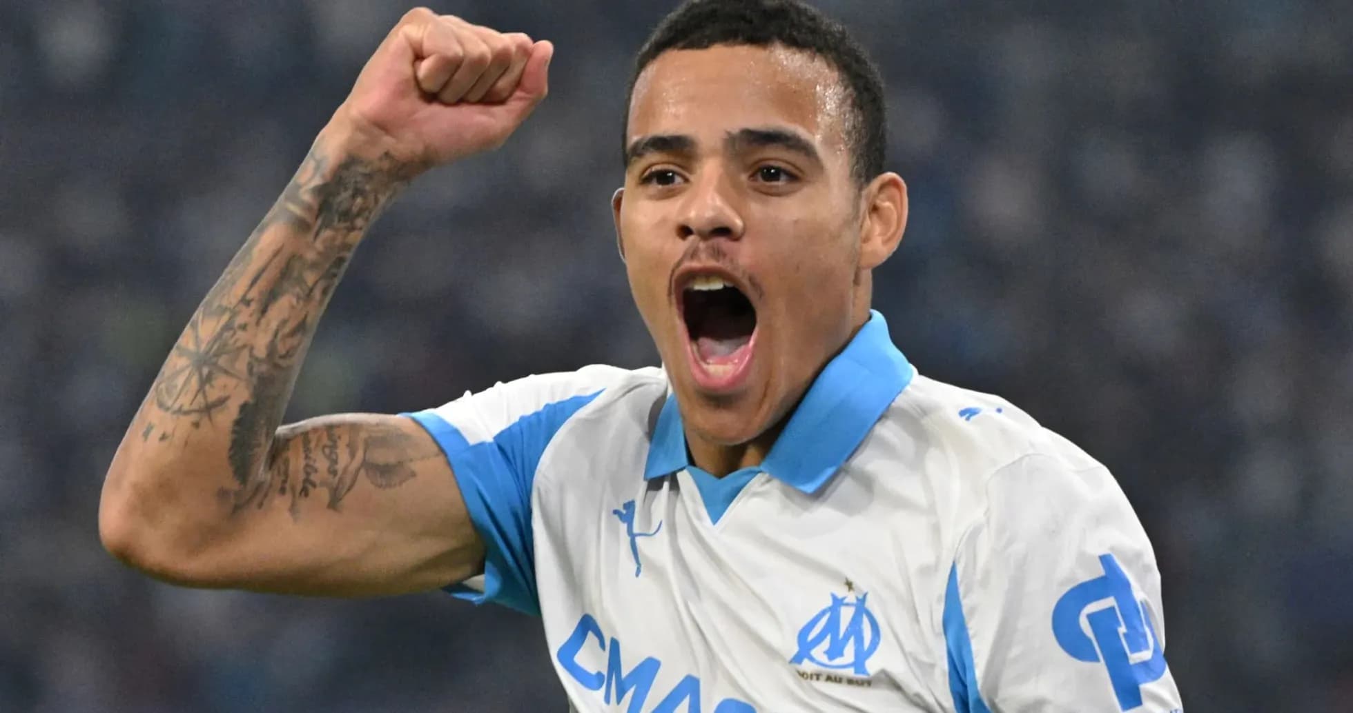 Player celebrating a goal for Marseille Player celebrating a goal for Marseille