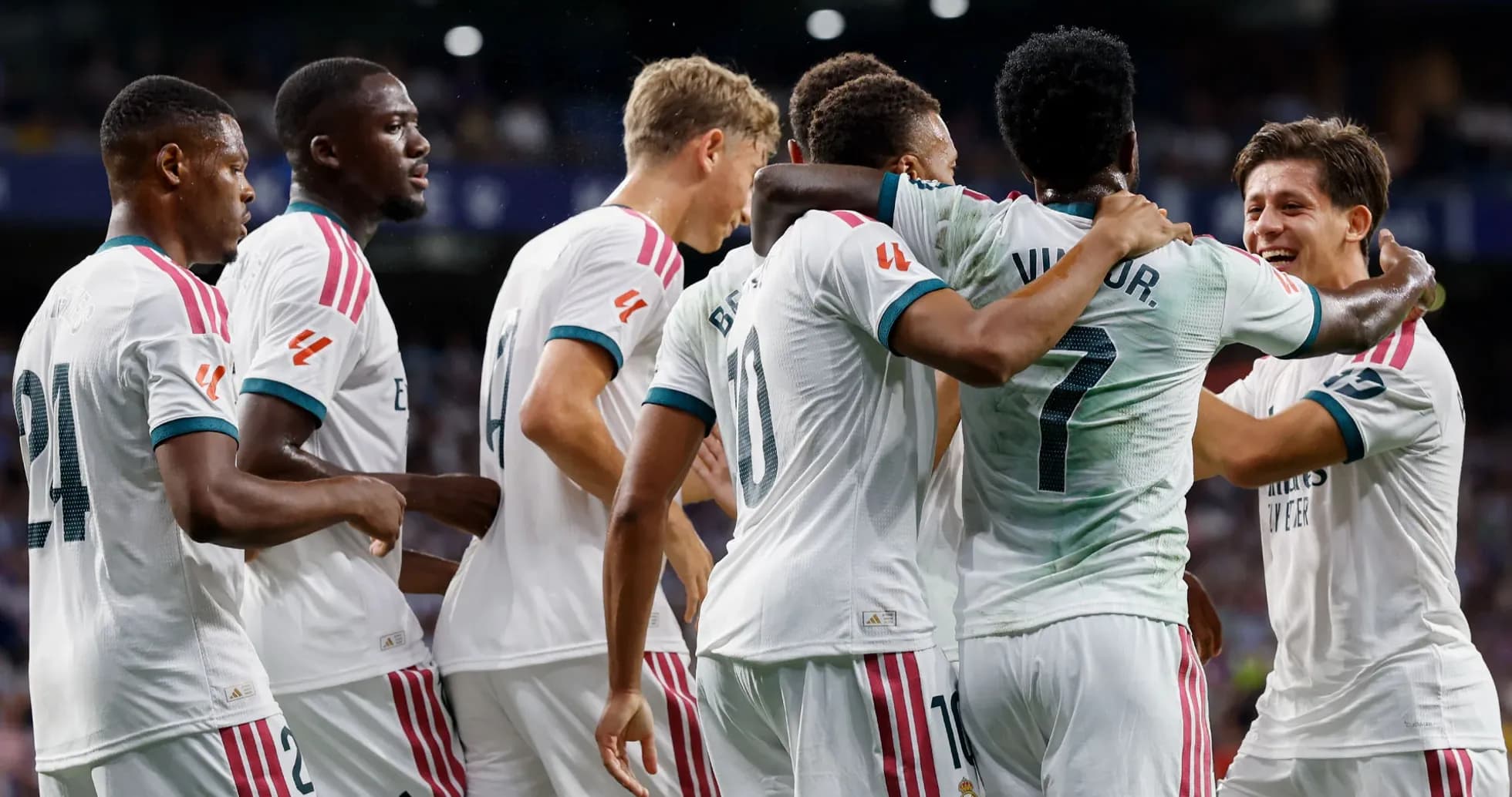Real Madrid players celebrating a goal Real Madrid players celebrating a goal
